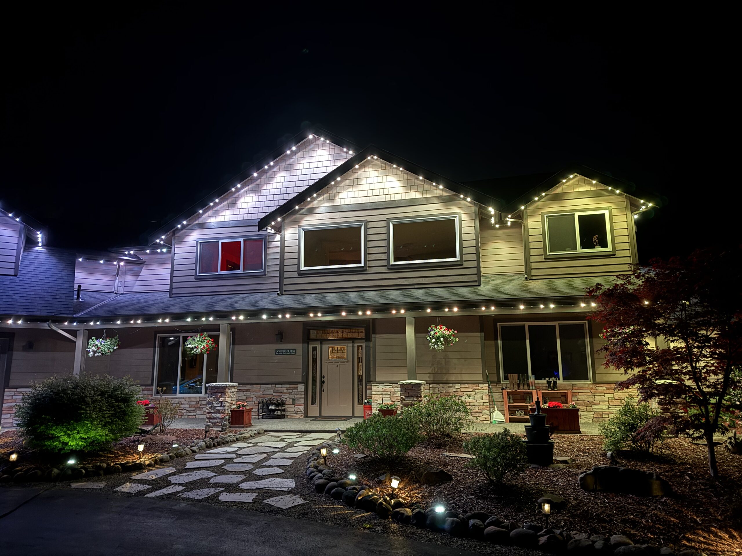 House with holiday permanent lights